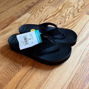 Brand new Reef platform Flip Flops. 8.